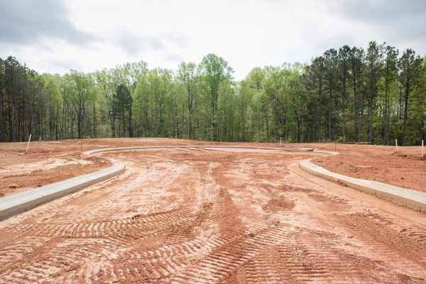 New home residential subdivision development of roads and curbs New home residential subdivision development of roads and curbs